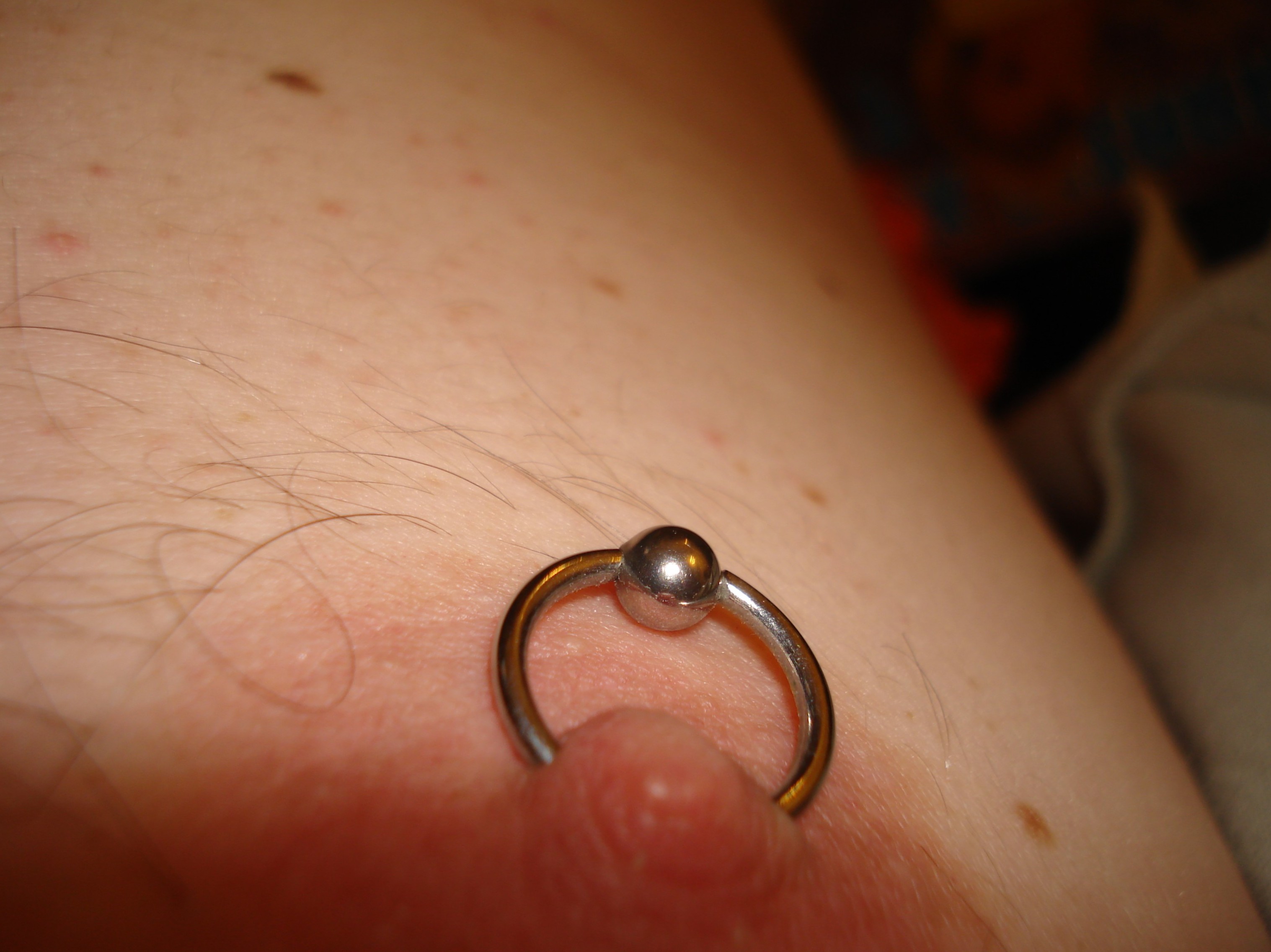 my hubby's pierced nipple mmmm
